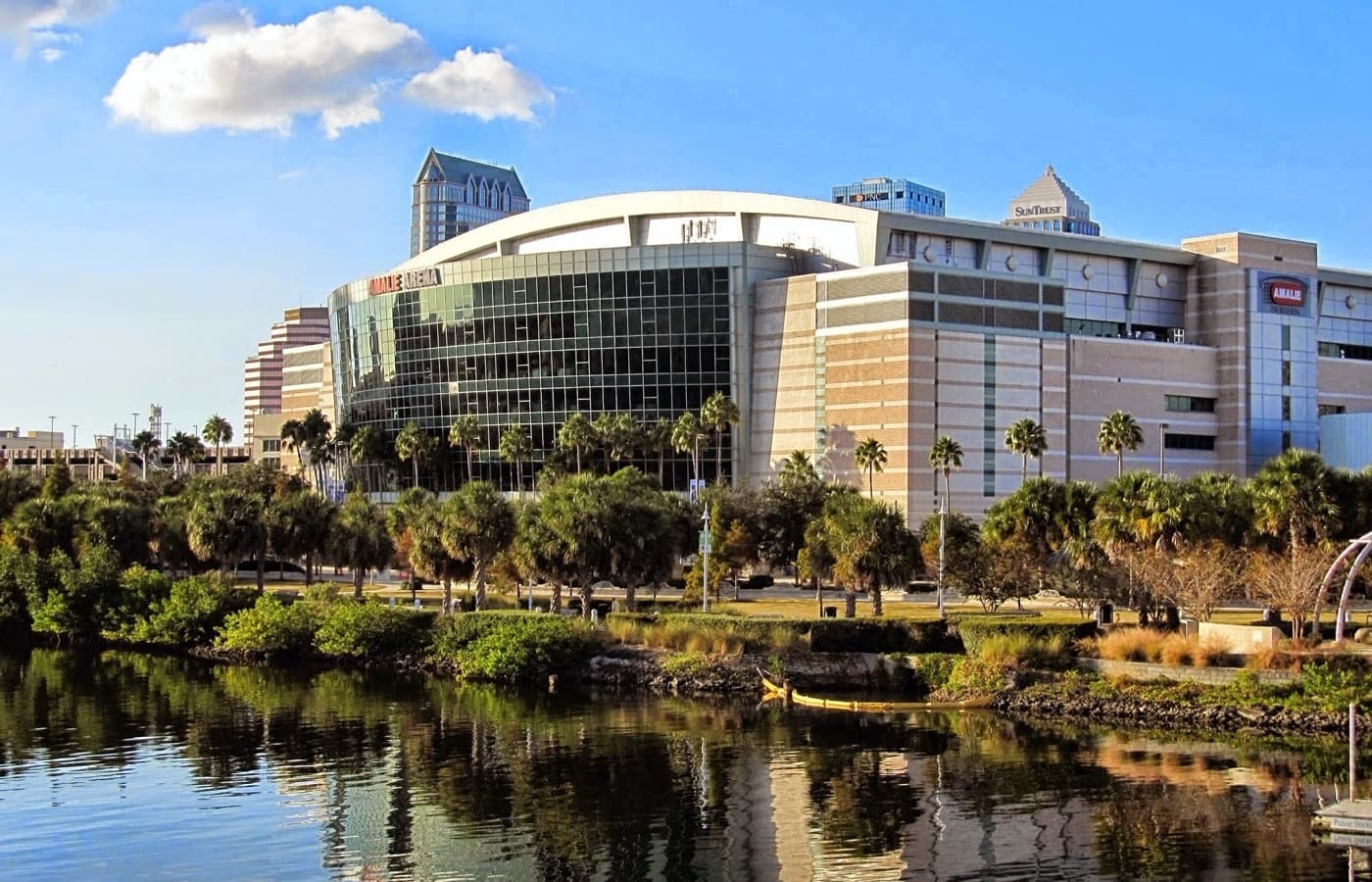 Benchmark International Arena, then signed as Amalie Arena, seen across the water with downtown Tampa towers behind it