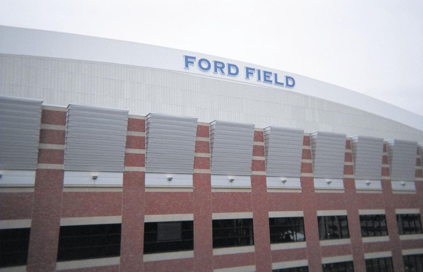 Ford Field’s brick facade and roof sign in downtown Detroit