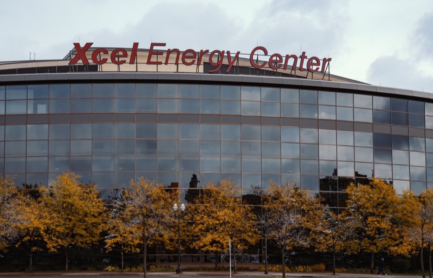 The arena’s curved glass exterior in downtown Saint Paul in autumn, photographed in 2018 when it still carried its former name, Xcel Energy Center