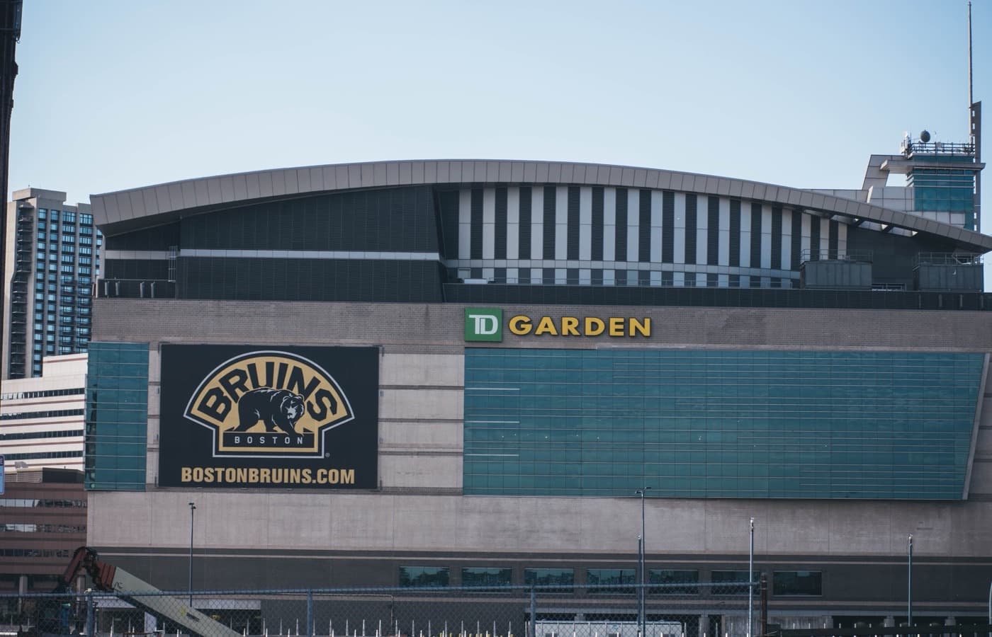 Exterior of TD Garden in Boston, with the Bruins logo and TD Garden sign on the building’s façade