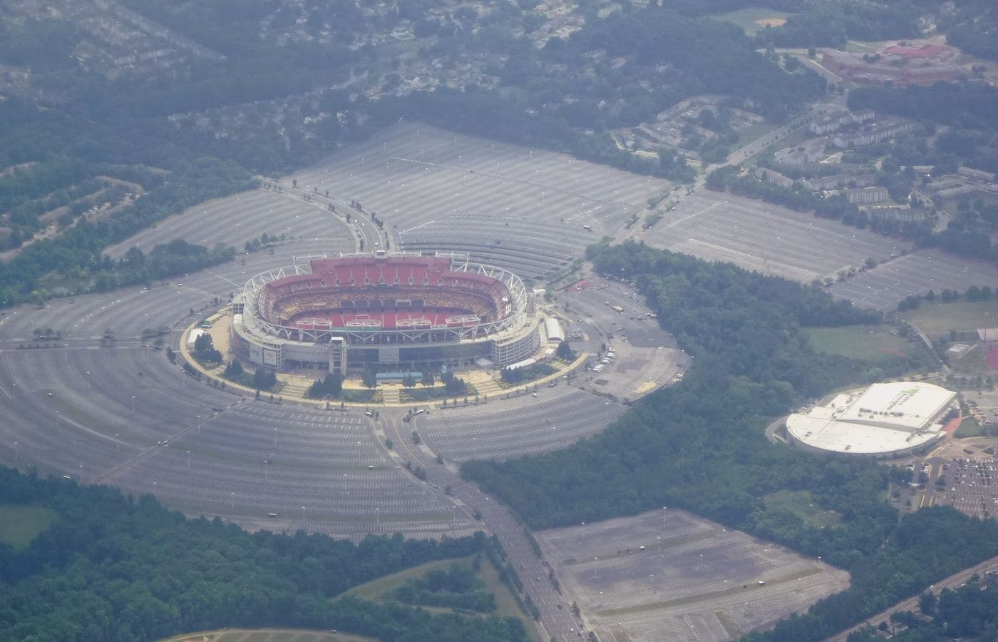 Aerial view of Northwest Stadium, then called FedExField, in Landover, Maryland, ringed by its parking lots